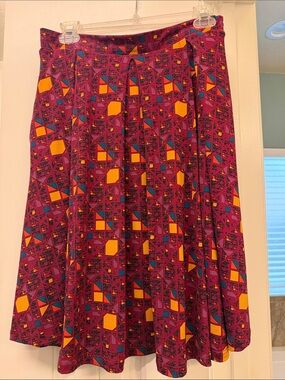 LuLaRoe Circle Skirt in Magenta with Yellow and Teal Geometric Print